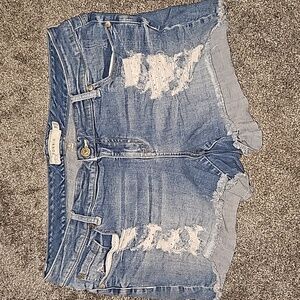 Distressed denim shorts